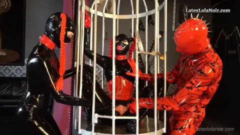 LatexLaraAndLolaNoir Rubberdolls Used In The Birdcage