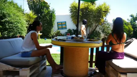 Spanish Pegging And Foot Fetish – Ladies Ghalia And Isis Eating After a Day Of Filming